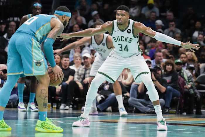 Milwaukee Bucks forward Giannis Antetokounmpo (34) back on defense against Charlotte Hornets forward Miles Bridges (0)